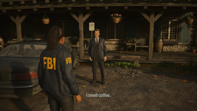 Two FBI agents stand outside a hotel talking about coffee in Alan Wake 2
